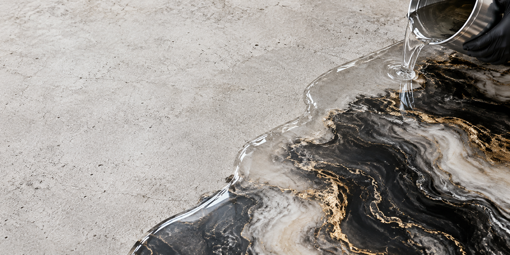 Epoxy-pour concept showing raw concrete becoming a black-and-gold finished surface
